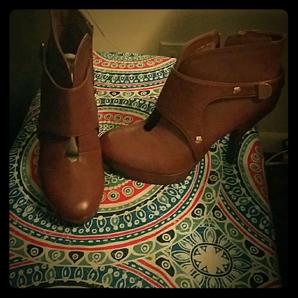Unlisted..  brown leather booties